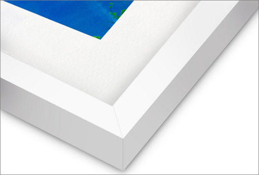 a white and blue painting on a white wall